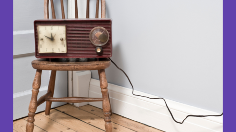 image of a vintage radio sitting on a vintage chair