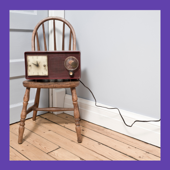 image of a vintage radio sitting on a vintage chair